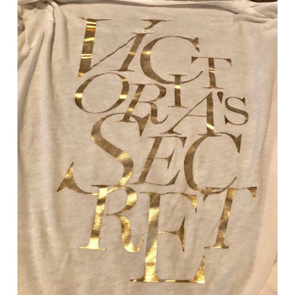 White Victoria’s Secret robe with gold letting